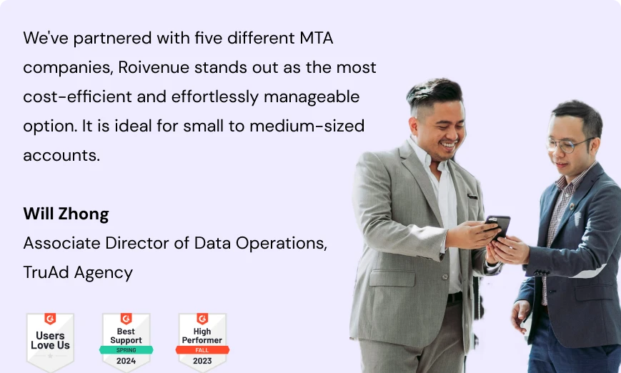 Two business men looking at a smartphone with a testimonial and awards for Roivenue